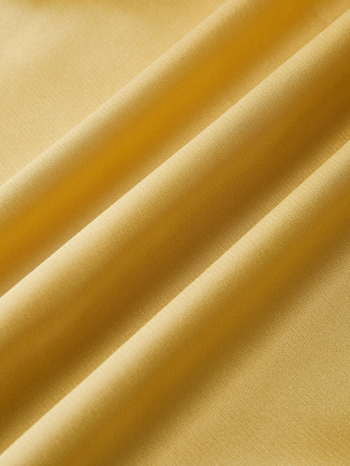 Asimetrik Volanlı Sırtı Açık Uzun Elbise