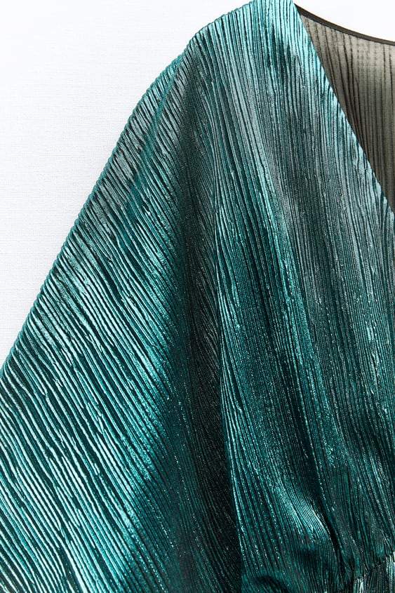 Jocelyn V Yaka Metalik Plise Tulum